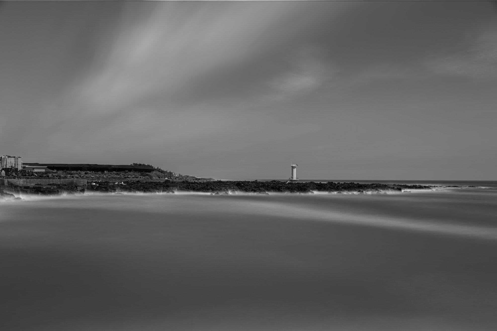 Coastline with lighthouse